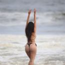 Nina Svet – Posing in a bikini at beach for 138 Water in Malibu - 454 x 681