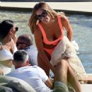 Laura Anderson – Seen in a coral swimsuit in Mykonos - 454 x 569
