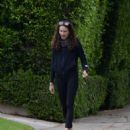 Troian Bellisario – Out for a walk with her dog in Los Angeles