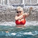 Caroline Vreeland – In a red bikini in Positano - 454 x 333