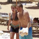 Jennette McCurdy wearing a pretty bikini and board shorts was spotted kayaking with a male friend in Maui