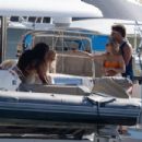 Brittany Matthews – In a orange bikini on a yacht in Cabo San Lucas