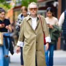 Dakota Fanning – Wearing a trench coat while out in New York