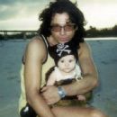 Michael Hutchence and his daughter Tiger Lily - 454 x 341