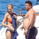 Shirtless Ronaldo Nazário, 45, packs on the PDA with his bikini-clad girlfriend Celina Locks, 32, aboard lavish yacht during romantic Formentera getaway - 454 x 570