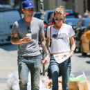 Adam Levine and Behati Prinsloo apartment hunting in NYC (July 29)
