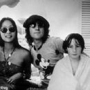 Dec 27, 1974 John Lennon and May Pang in Palm Springs, Florida, after their visit at Disneyworld - 454 x 347