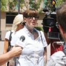 Janine Lindemulder speaks with reporters outsidet the Lamoreaux Justice Center to hear an expected ruling on visitation rights in her child-custody battle with ex-Jesse James. Lindemulder is fighting for visitation rights with their 6-year-old daughter - 454 x 303