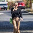 Hilary Duff – In a snakeskin pants running errands in Studio City