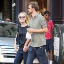 A smitten looking Dakota Fanning and her boyfriend Jamie Strachan go hand in hand for a stroll around New York City - 404 x 594
