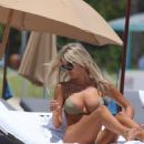 Melissa Castagnoli – In a beige bikini at the beach in Miami