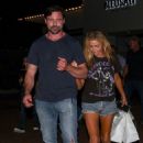 Denise Richards & her husband walk arm in arm as they leave after dinner with her daughter Eloise at Lucky’s in Malibu