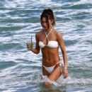 Jocelyn Chew – In white bikini on the beach in Miami - 454 x 356