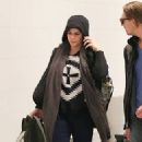 Neve Campbell and JJ Feild seen at LAX on November 19, 2014 in Los Angeles, California.
