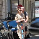 Lily Collins – With hubby Charlie McDowell seen using an electric sharing scooter in Paris