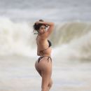 Nina Svet – Posing in a bikini at beach for 138 Water in Malibu - 454 x 681