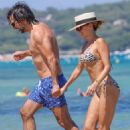 Sylvie Meis – Bikini candids at the beach in Saint Tropez - 454 x 681