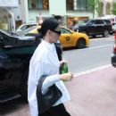 Katy Perry – In an oversized dress shirt in New York