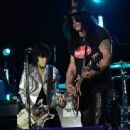 Joan Jett and Slash performance together at the 2014 Gibson Brands AP Music Awards at the Rock and Roll Hall of Fame and Museum on July 21, 2014 in Cleveland, Ohio