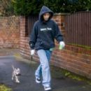 Chelcee Grimes – On a stroll with her pet pooch in Liverpool