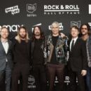 Foo Fighters attend the 36th Annual Rock & Roll Hall Of Fame Induction Ceremony at Rocket Mortgage Fieldhouse on October 30, 2021 in Cleveland, Ohio - 454 x 303