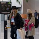 Cara Delevingne – Spotted at the airport leaving Cabo San Lucas