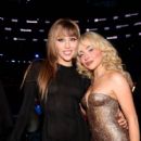 Miley Cyrus and Sabrina Carpenter - The 67th Annual Grammy Awards - Backstage - 408 x 612
