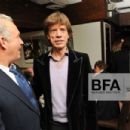 Mick Jagger & L'Wren Scott at CHANEL and CHARLES FINCH Host a Pre-Oscar Dinner Celebrating Fashion and Film, in Madeo Restaurant, Beverly Hills, Los Angeles - 27 Feb 2011 - 454 x 302