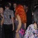 Charli XCX – Wearing a orange wig and knee high zebra pattern boots at Playboy party in Miami Beach