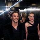 Cougar alert! Sharon Stone leaves Vogue party with Argentinian model Martin Mica in Brazil - 454 x 693