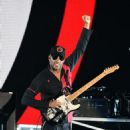 Tom Morello of Prophets of Rage performs onstage during KROQ Almost Acoustic Christmas 2017 at The Forum on December 9, 2017 in Inglewood, California - 454 x 532