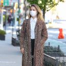 Dianna Agron – In a leopard print overcoat while out in New York