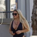 Bianca Gascoigne – Seen in a black swimsuit at Ibiza’s Cala de Bou beach - 454 x 581