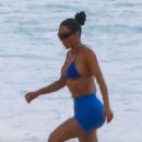 Kim Kardashian – Seen in a blue top bikini at the paddle boarding session in Turks - 454 x 681