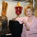 'I'm heartbroken': Debbie Reynolds is set to make millions as she reluctantly auctions off 3,500 items of film memorabilia