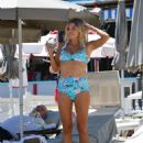 Sophie Monk in Blue Bikini on a beach in Portofino