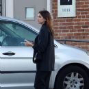 Kaia Gerber – Busy on her phone while leaving a studio in Los Angeles