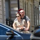 Lily Collins &#8211; With hubby Charlie McDowell seen using an electric sharing scooter in Paris