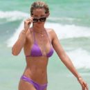 Baskin Champion in Purple Bikini at the beach in Miami - 454 x 749