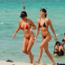 Celeste Bright – in a black bikini at the beach in Miami - 454 x 302