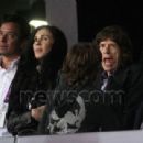 Mick Jagger and L'Wren Scott at the in the Olympic Stadium at the 2012 Summer Olympics, in London - 6 August 2012 - 454 x 309