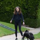 Troian Bellisario – Out for a walk with her dog in Los Angeles - 454 x 505