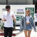 Madison Beer in Daisy Dukes with Zack Bia at South Beverly Grill in Beverly Hills