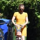 Kate Mara in Summer Yellow Dress in Los Feliz