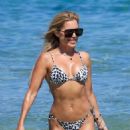 Sylvie Meis – Bikini candids at the beach in Saint Tropez - 454 x 681