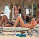 Toni Poole – In a bikini at the beach in Portugal - 454 x 303