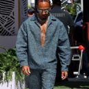 Ab-baring Lewis Hamilton is dripping in jewellery after backing down on promise to boycott the Miami Grand Prix over piercings clash with F1 boss