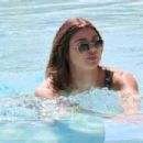 Raquel Leviss – Displays her green bikini at the pool in Scottsdale, Arizona - 454 x 303