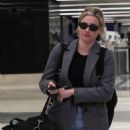 Lili Reinhart – Seen at LAX Airport in Los Angeles - 454 x 681