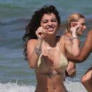 Malu Trevejo – In a gold bikini during a beach day in Miami - 454 x 682